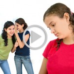 Why Do Children Bully? two young girls laughing behind another girls back